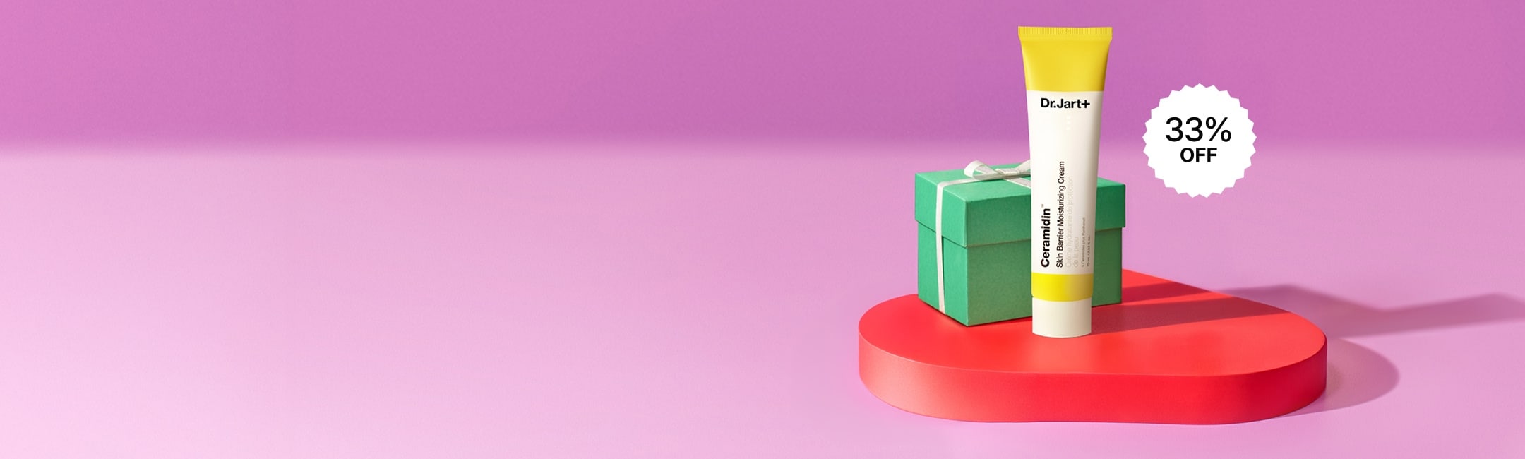 Ceramidin Body Lotion on a bright blue background next to coconut pieces 