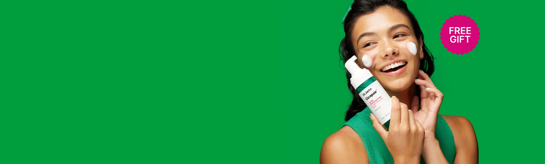 Ceramidin Body Lotion on a bright blue background next to coconut pieces 