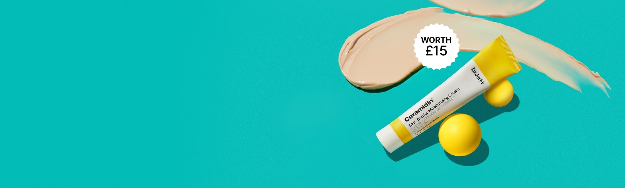 Ceramidin Body Lotion on a bright blue background next to coconut pieces 